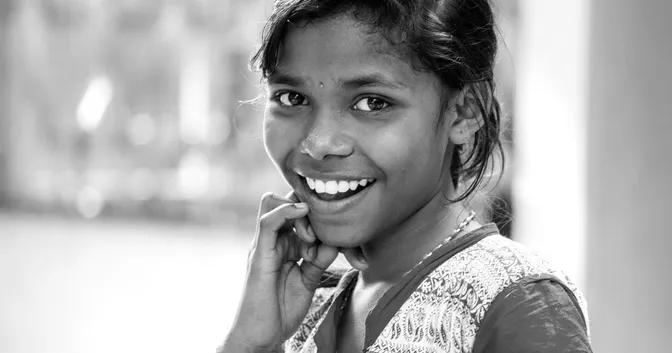 A young Indian lady looking chearful and happy